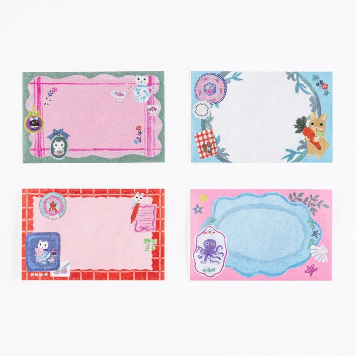 Hobonichi 2026 Accessories: Yumi Kitagishi - Sticky Note Roll - White Cat’s Table Decorations, shown from another angle.