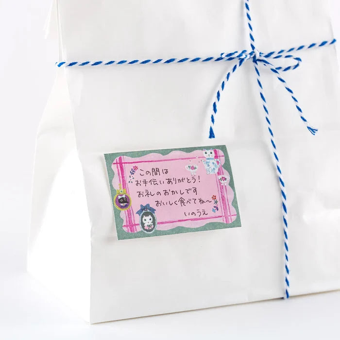 Hobonichi 2026 Accessories: Yumi Kitagishi - Sticky Note Roll - White Cat’s Table Decorations, shown in full.