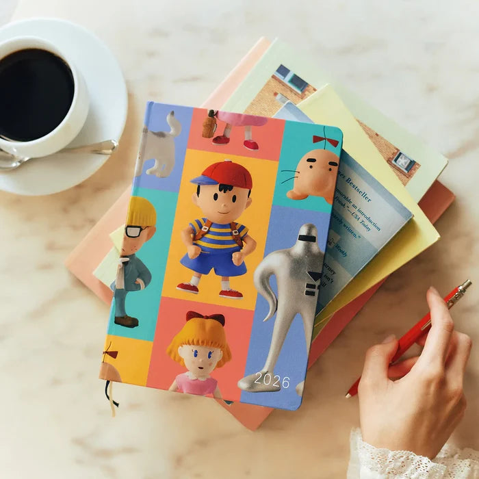 Hobonichi HON A5 2026 Planner: MOTHER - Clay Figurines, detail view of the design.