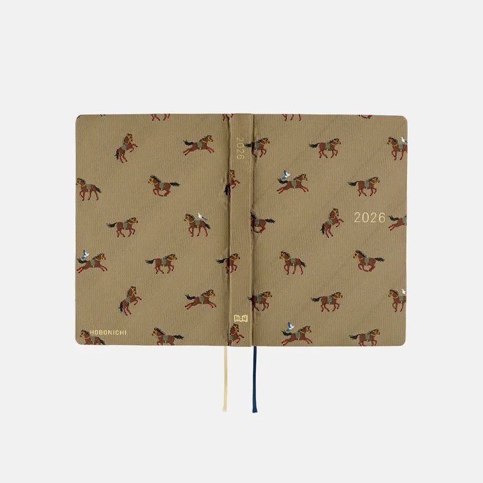 Hobonichi HON A6 2026 Planner: Bow & Tie - Galloping Horses, shown from another angle.