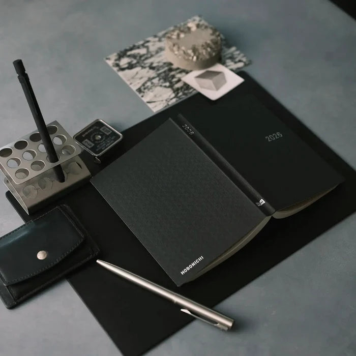 Hobonichi HON A6 2026 Planner: Paper Series - Black Gingham, close-up view.