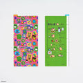 Hobonichi x Tamagotchi - Hobonichi Pencil Board for Weeks (90’s Tamagotchi), shown from the front.
