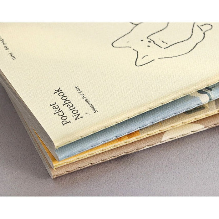 Stack of Iconic Adorable Handy Pocket Notebooks v.3 showing slim pocket-sized design.