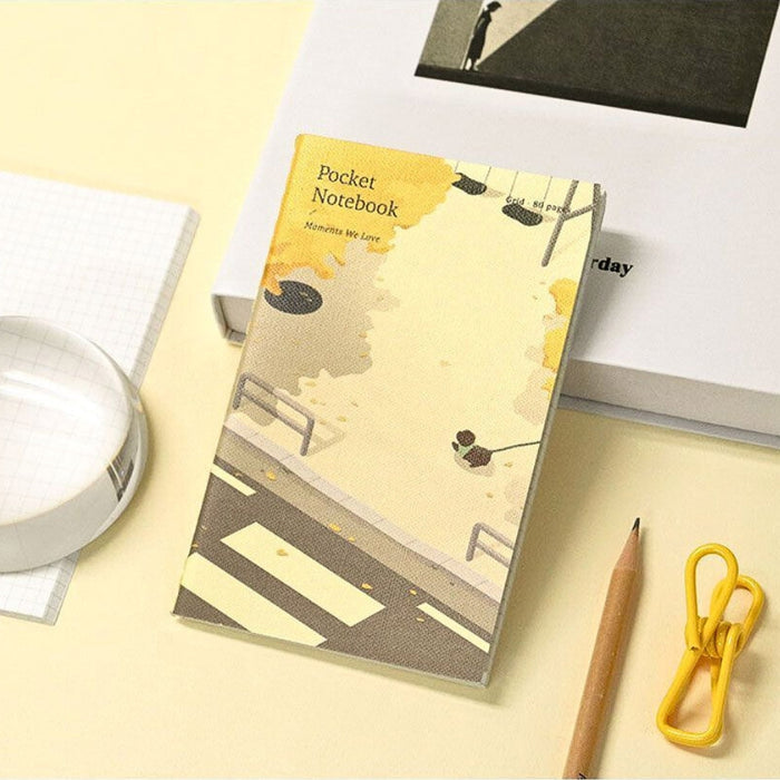Iconic Adorable Handy Pocket Notebook v.3 placed on a desk, ideal for notes and journalling.