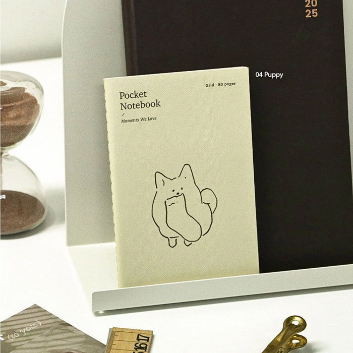 Iconic Adorable Handy Pocket Notebook v.3 showing puppy designs.