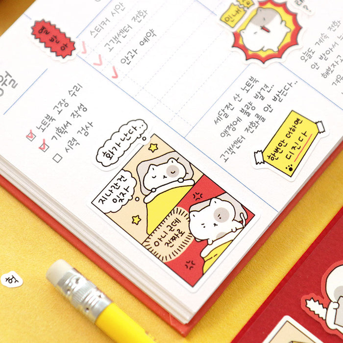 The Journal Shop - Open diary with red and yellow pages decorated using Blah Blah stickers for journaling and scheduling.