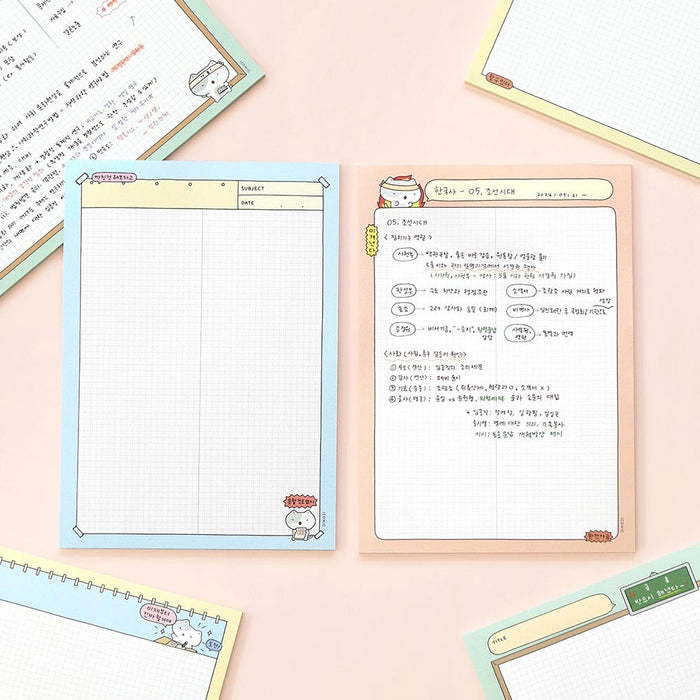 The Journal Shop - Iconic Blah Blah B5 Memo Notepad open showing ruled writing space and colourful border design.