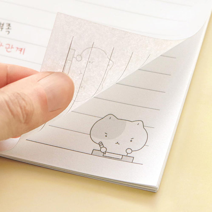 The Journal Shop - Iconic Blah Blah B5 Spiral Lined Notebook open to show lined pages with small doodle illustration in corner.