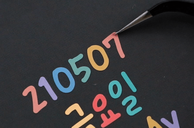 Iconic Calligraphy Alphabet Sticker Pack — 10 Sheets, shown from another angle.