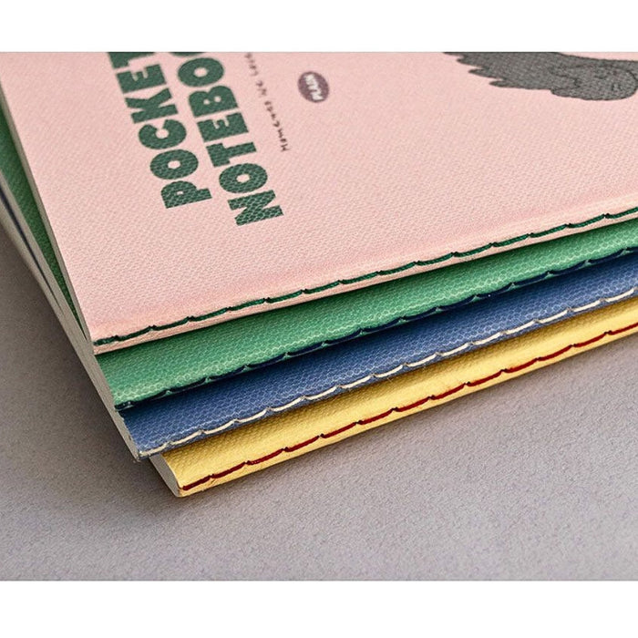 Stack of Iconic Charming Handy Pocket Notebook v.3 plain notebooks showing cover colours.
