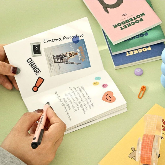 Hand writing inside an Iconic Charming Handy Pocket Notebook v.3 plain.