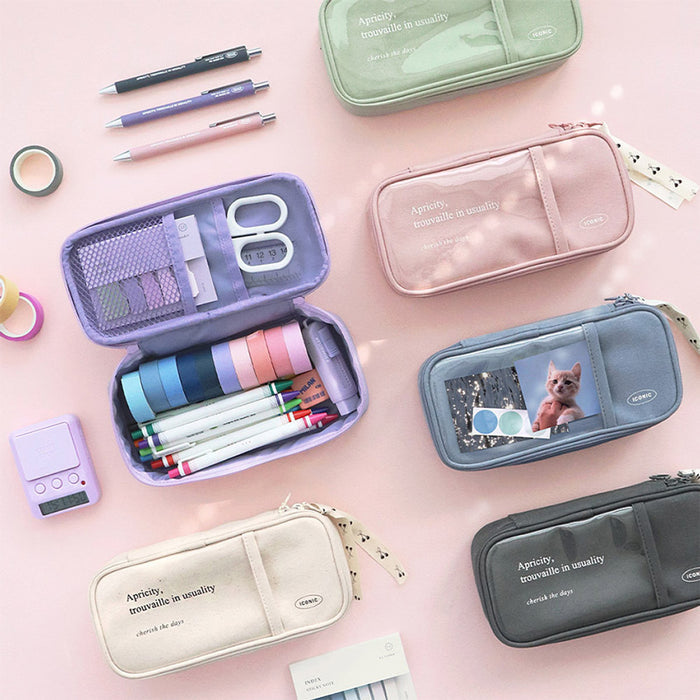 The Journal Shop - Collection of Iconic Cottony Grand Pen Pouches in soft pastel colours displayed with stationery.