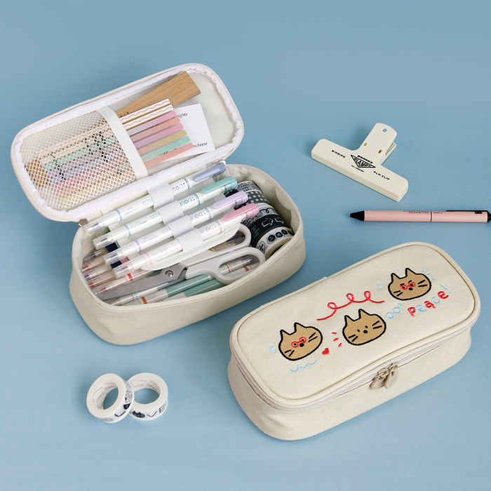 The Journal Shop - Iconic Doodle Large Capacity Pen Pouch open showing stationery storage with pens, clips, and sticky notes.