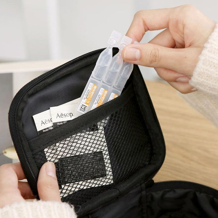 The Journal Shop - Black Doodle Mini Pouch opened to reveal mesh pockets.