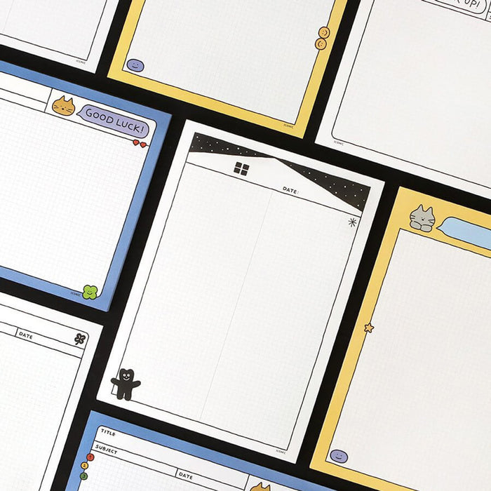 The Journal Shop - Iconic Doodle B5 Grid Notepad pages with grid layout shown in multiple colours including blue and white.
