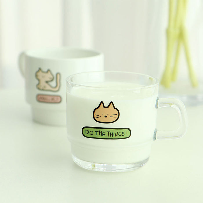The Journal Shop - Glass cup decorated with a cute cat-themed doodle sticker from the Iconic Doodle Removable Sticker Pack.