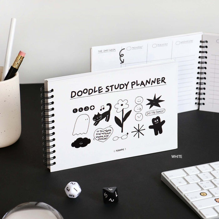 The Journal Shop - Black and white Doodle Study Planner open beside stationery and a study checklist layout.