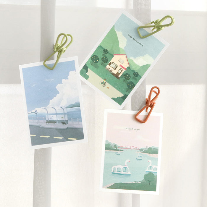 The Journal Shop - Iconic Haru Message Cards hung with clips and arranged decoratively on bright white background.