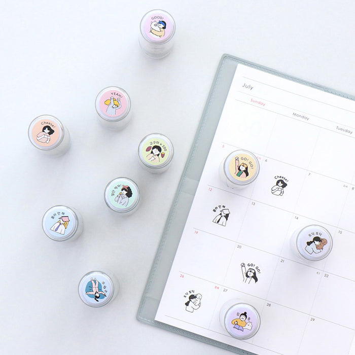 The Journal Shop - Set of Haru Self-Inking Diary Stamps shown beside a planner page featuring stamped icons.