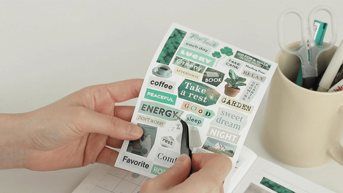Iconic Magazine Collage Sticker Pack — 6 sheets, shown from the front.