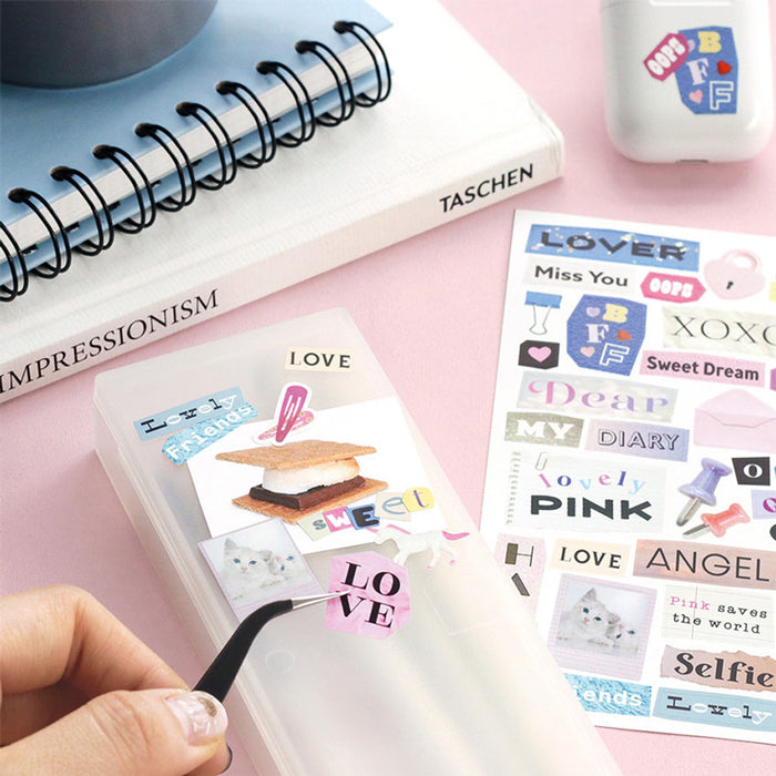 The Journal Shop - Person using tweezers to apply magazine-style stickers.