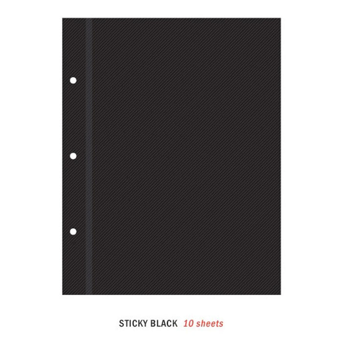 The Journal Shop - Close-up of a black refill sheet designed for scrapbooking.