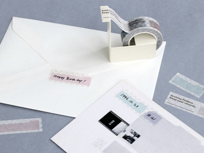 The Journal Shop - Envelopes and stationery decorated with strips of Iconic Shape Masking Tape in pastel colours and minimalist shapes.
