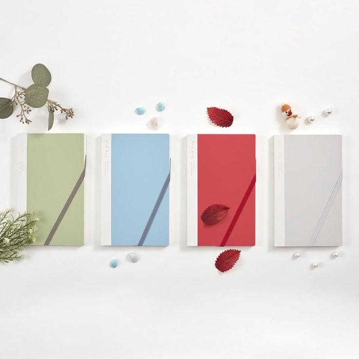 Daigo Isshoni Day Log B6 Slim Notebooks in green, blue, red and grey covers.
