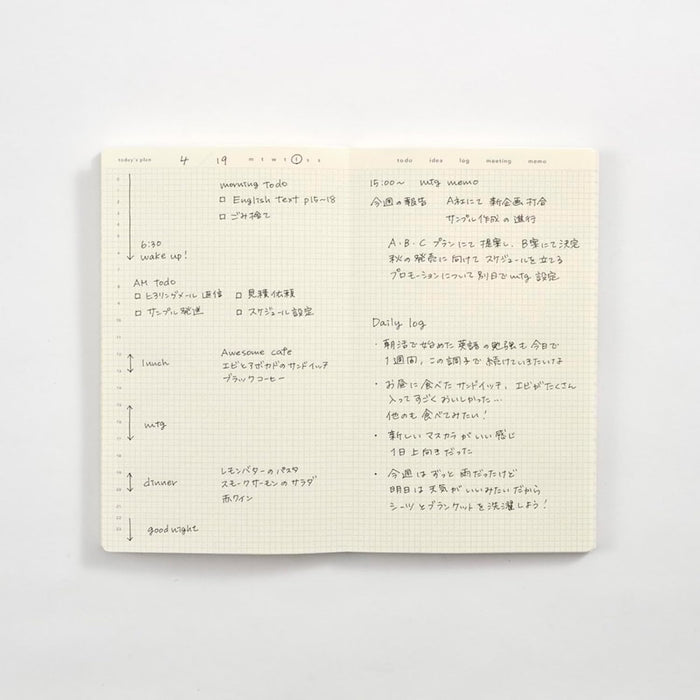 Open Daigo Isshoni Day Log B6 Slim Notebook showing handwritten daily entries.