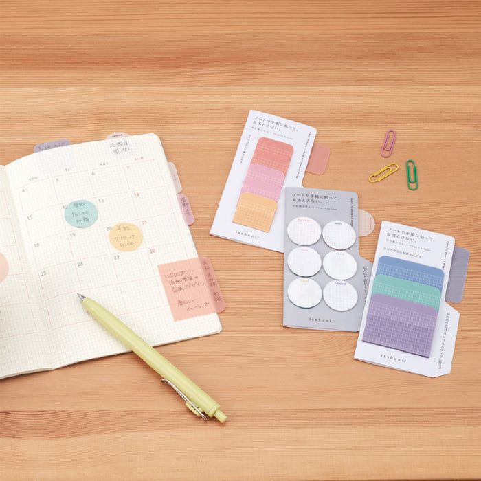 Desk scene with Daigo Isshoni Things to Do sticky notes alongside stationery items.