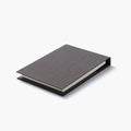Kakimori Mini Note Cover - Grey, shown from the front.