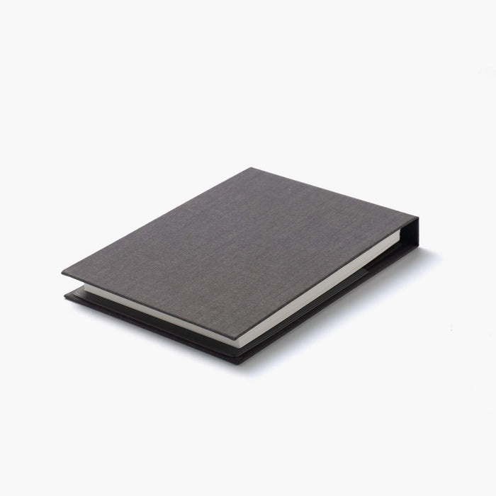 Kakimori Mini Note Cover - Grey, shown from the front.