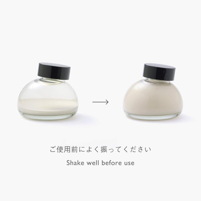 The Journal Shop - Two Kakimori Pearlescent Solution bottles displayed side by side showing subtle iridescent sheen.