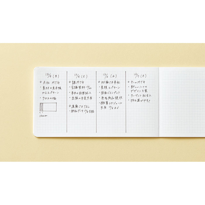 Close-up of horizontal page layout inside an EMILY notebook.