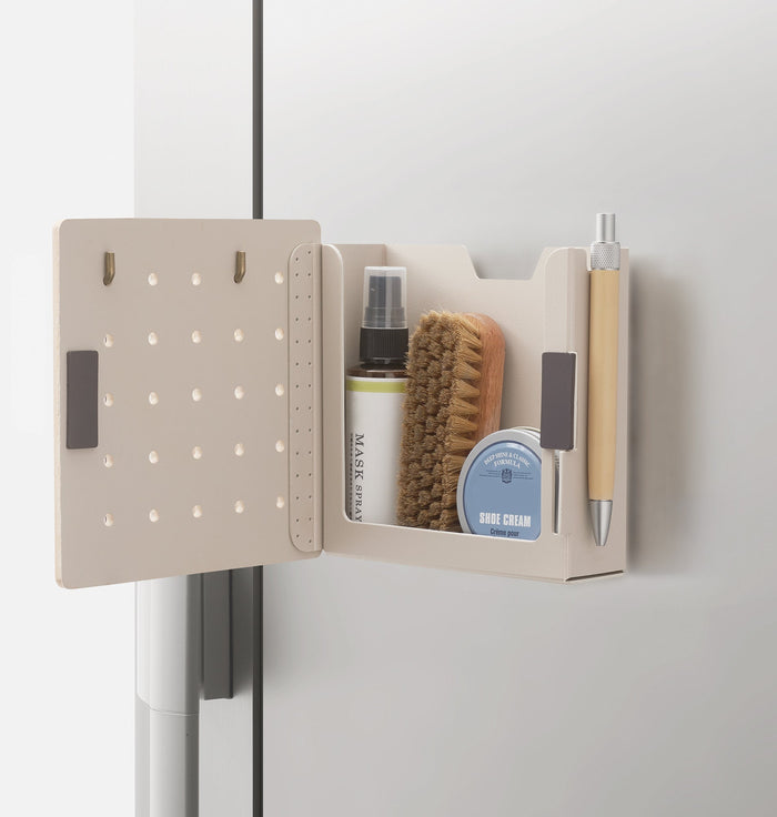 Harupeggy pegboard opened to reveal internal storage compartments and hooks.
