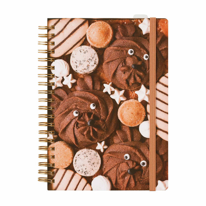 HITOTOKI ring notebook in comic size with illustrated patterned cover.
