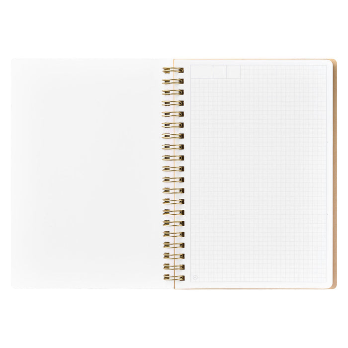 HITOTOKI comic size ring notebook with grid page.