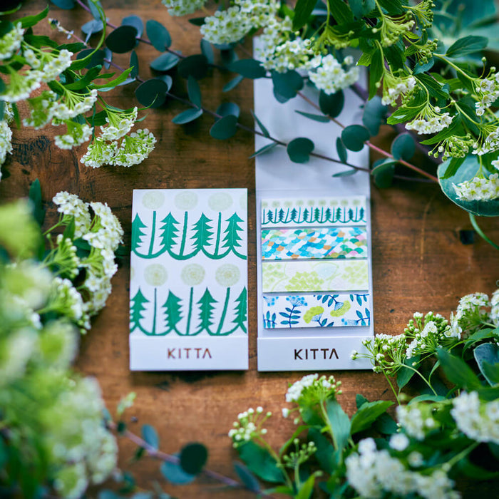 KITTA Basic Washi Stickers displayed among plants in a natural lifestyle setting.