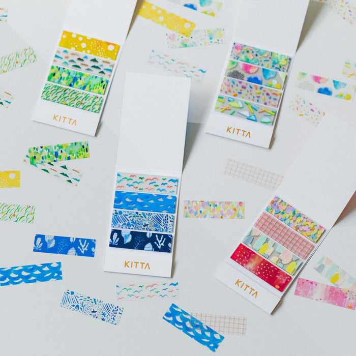 KITTA clear washi stickers assortment displayed with multiple translucent designs.