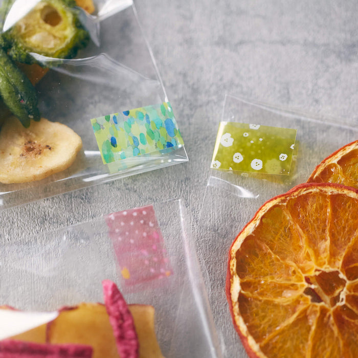 KITTA clear washi stickers featuring citrus-inspired translucent designs.