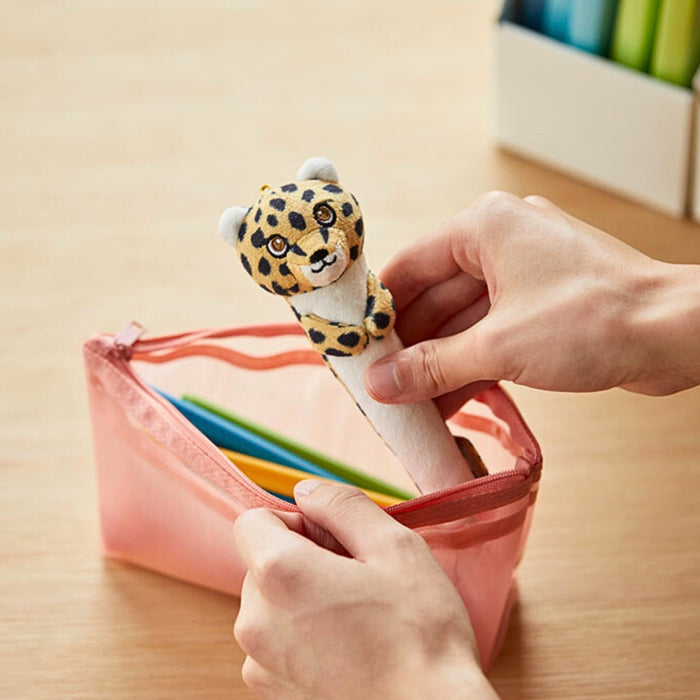 A hand holding a Leopard Pouzoo pen grip from pencil pouch.