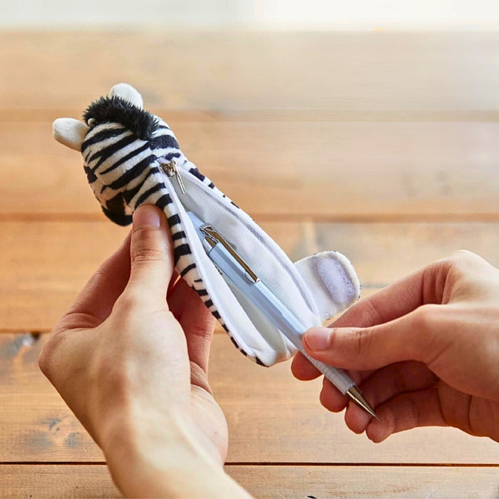 ebra Pouzoo pen grip held in hand demonstrating comfortable grip.