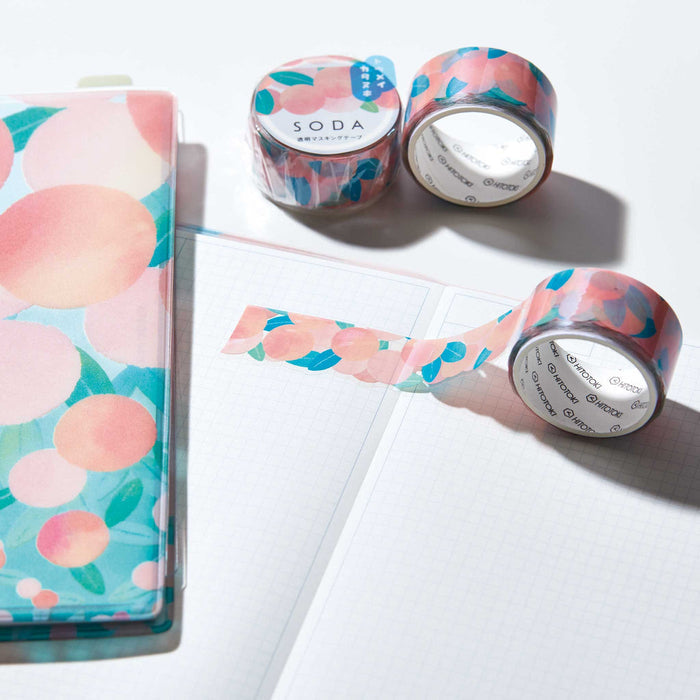 SODA 20mm die-cut masking tape rolls displayed on a notebook in a lifestyle setting.