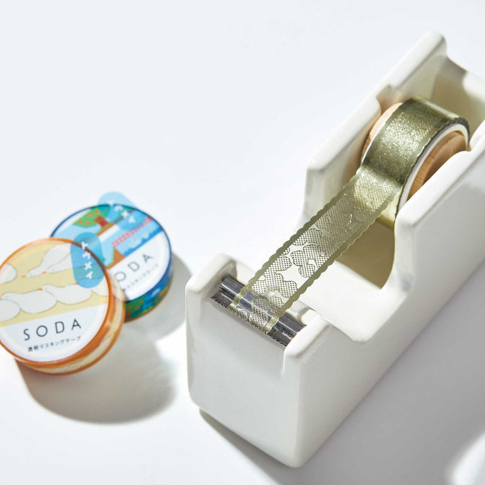 SODA foil and die-cut masking tape rolls placed in a compact tape dispenser.