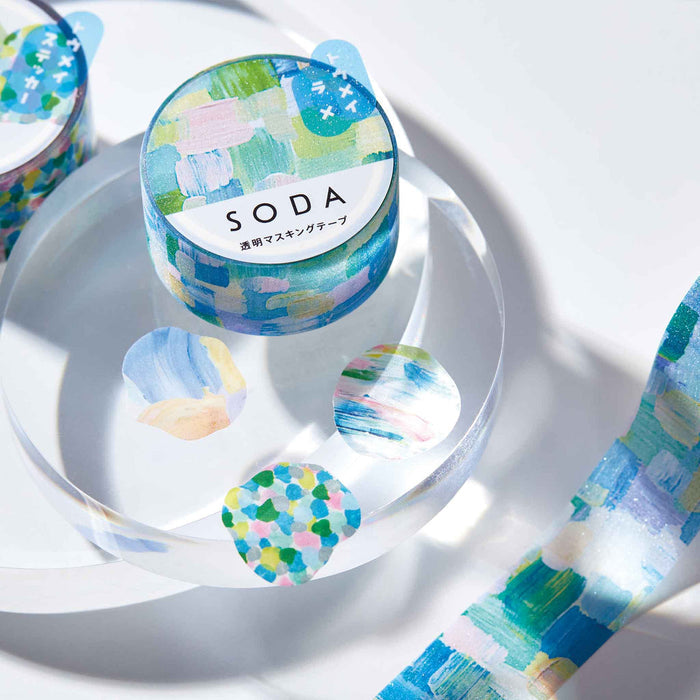 Hands tearing a strip of SODA glitter masking tape to show flexibility and sparkle.