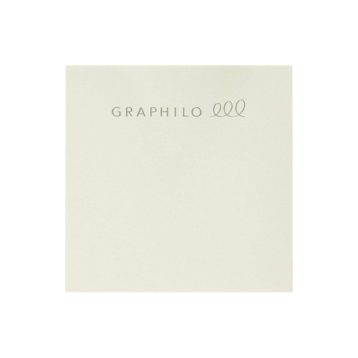Front of GRAPHiLO sticky memo pad with logo and subtle off-white cover.