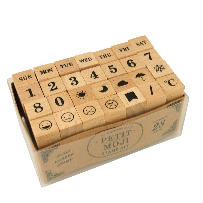 Kodomo No Kao Petit Moji Stamp Set – Large Days, Numbers, and Marks set, including SUN–SAT, 0–9, and various symbols like weather icons and emotive marks.