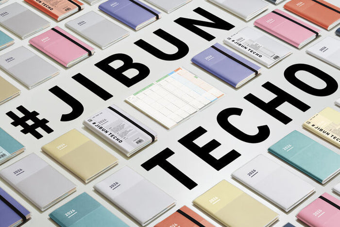 Collection of Kokuyo Jibun Techo diaries in assorted colours, including the 2026 A5 Slim white refill edition.