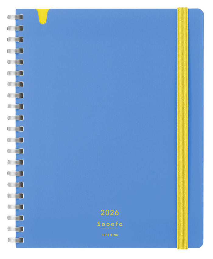 Front cover of Kokuyo Softring Sooofa Diary 2026 B6 Monthly Grid Notes in blue with yellow accent and spiral binding.