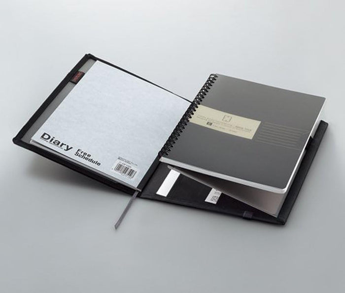 Kokuyo Systemic Cover Notebook Semi B5 open to show its pockets and compartments.